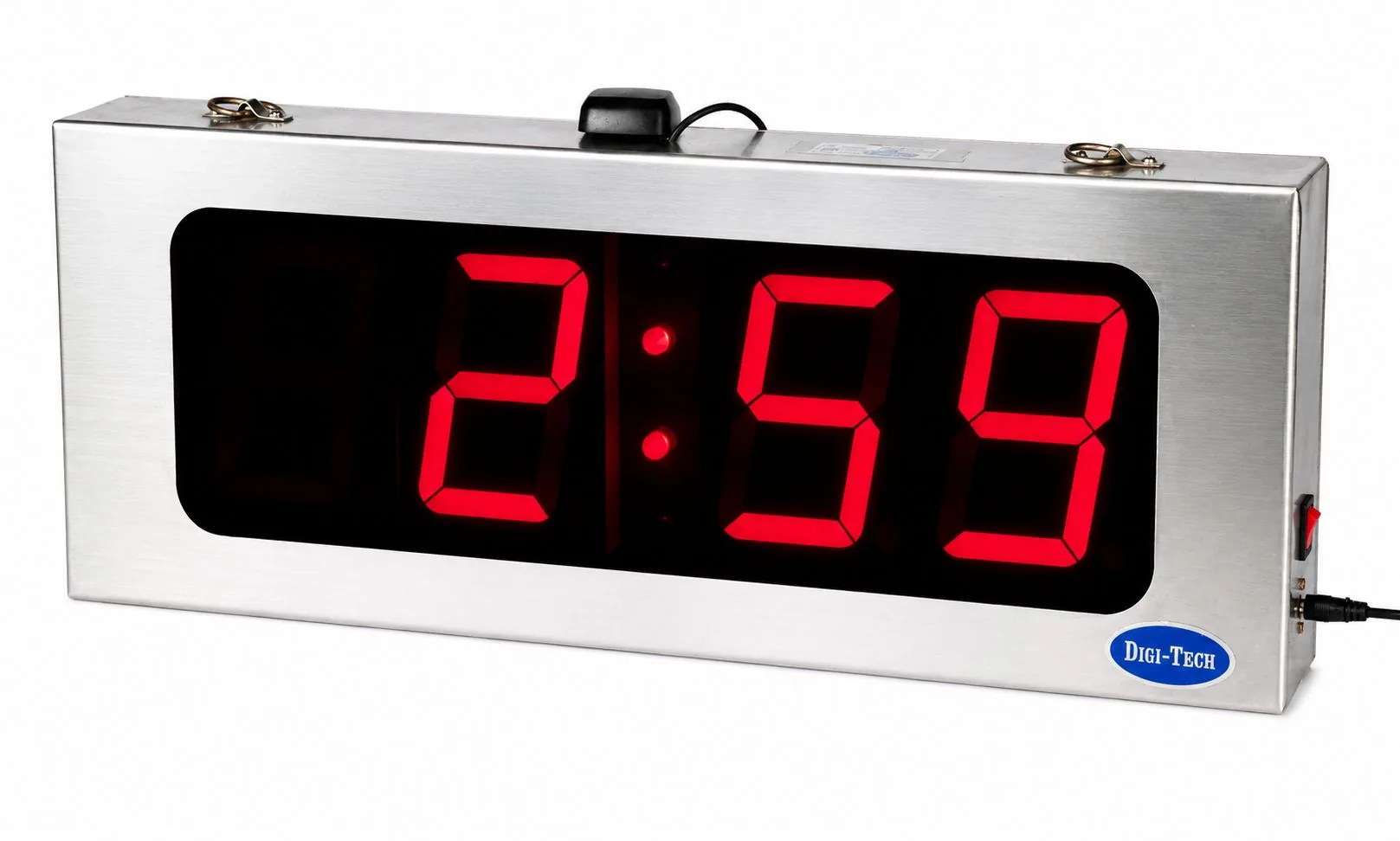 Stainless steel GPS digital clock with the GPS puck antenna mounted on top of the enclosure