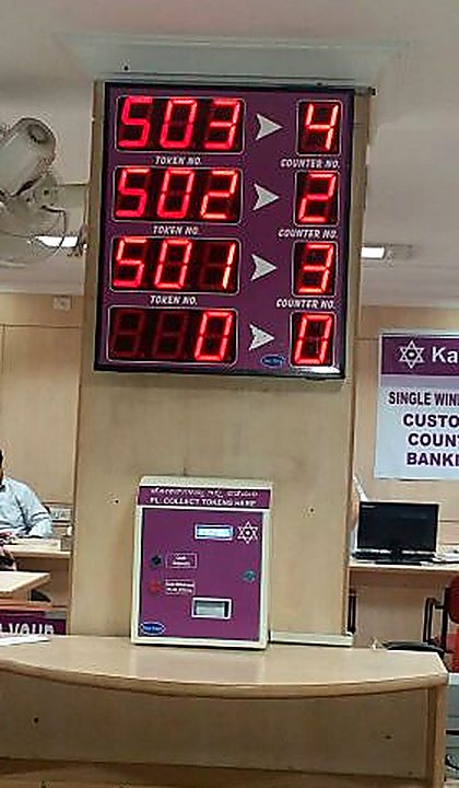 LED wireless queue display and push-button token dispenser at a Karnataka Bank branch